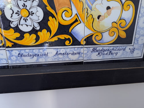 detail of a handpainted delfttile panel with its painters signature, being M. vande Berg