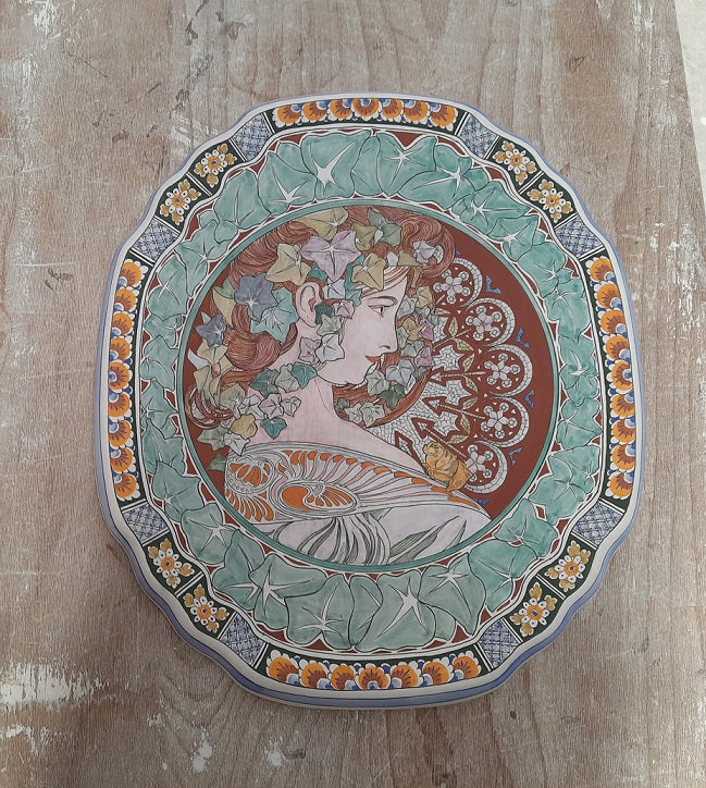 Large handpainted ceramic plaque , still unglazed with a fresh handpainted Mucha design.