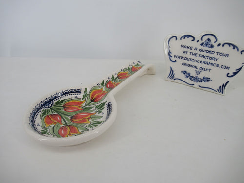 Large ceramic spoonrest painted in a red tulip design, showing 8 red tulips.