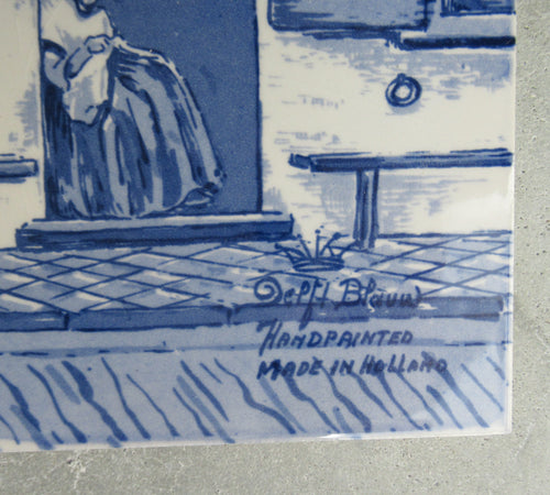 detail with marking of delft tile panel of Vermeer