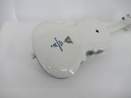 back view of a Delft polychrome ceramic violin with pottery marking
