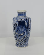 Delftblue handpaintedamphora vase depicting an oriental ghost