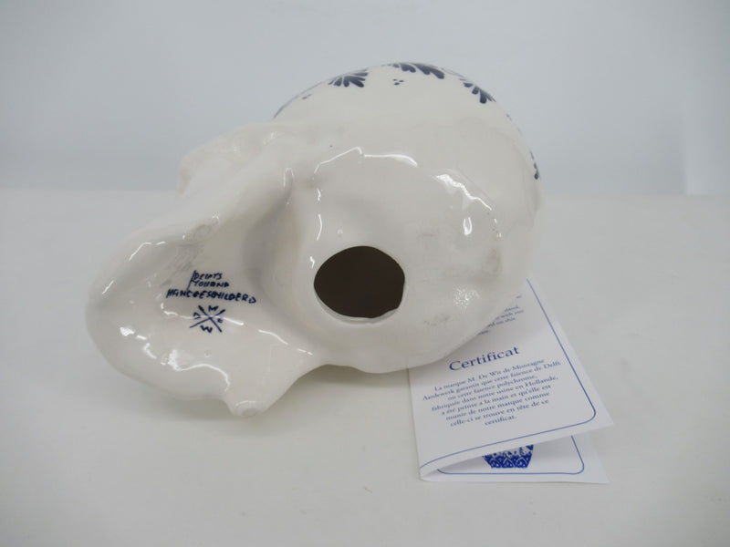 Delftblue ceramic skull showing potterys mark