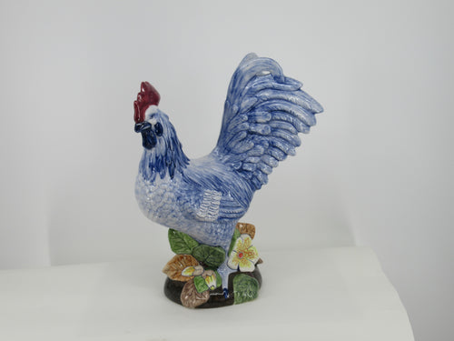 Handpainted ceramic rooster in multi colors.