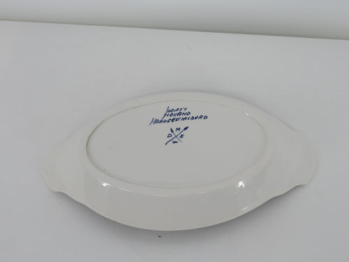 bottom side of delftware dish with its marking
