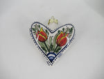 delftblue christmas ornament in heart shape with red tulips painted on