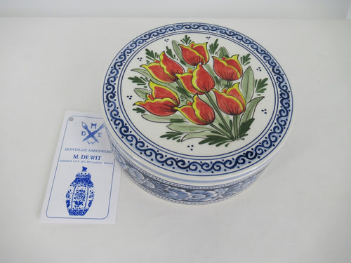 Large ceramic cookiesbox with red tulips.