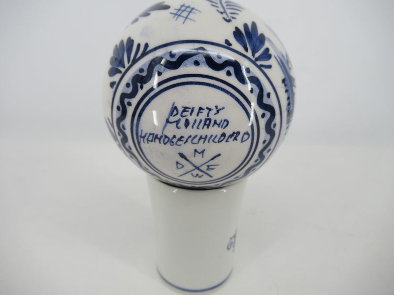Christmas ornament with potterys brand and signature on bottomside