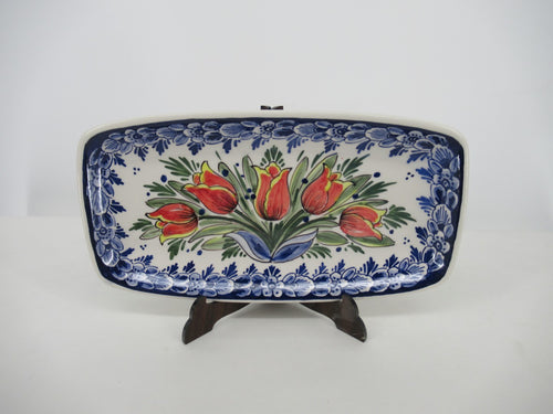 long ceramic dish decorated in the red tulip delft from de Wit, Holland