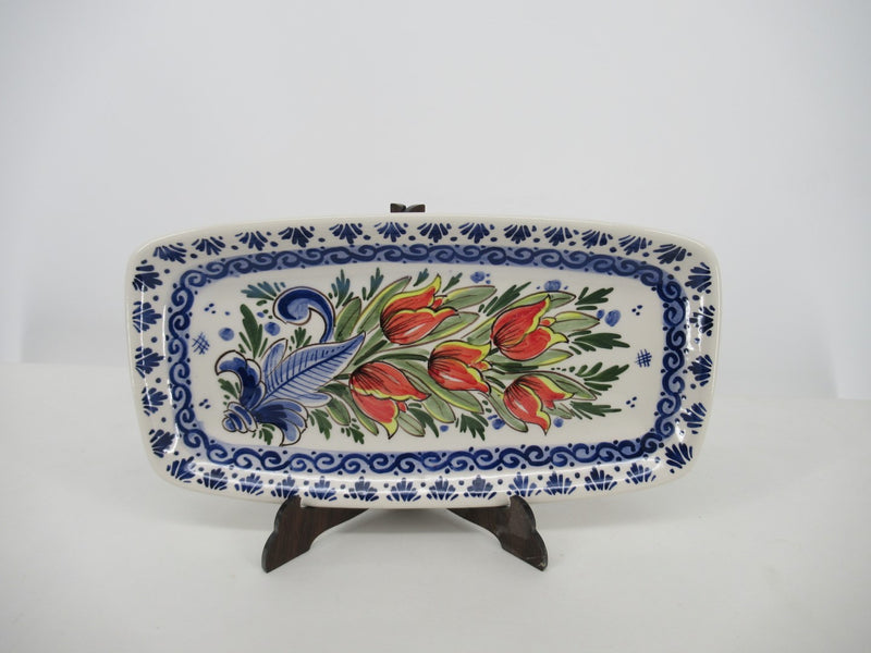 Rectangle ceramic dish decorated in red tulip design.