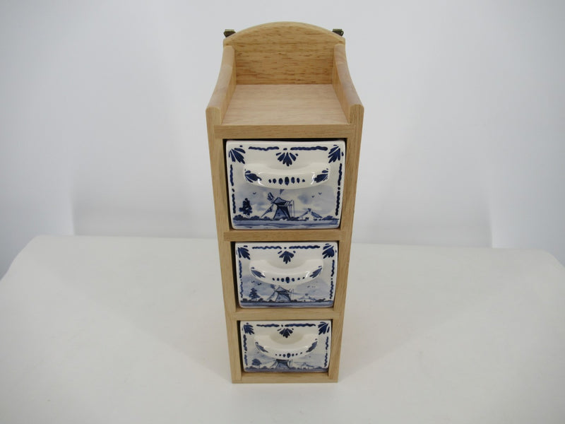 Woodrack with 3 ceramic drawers with delftblue windmill design.
