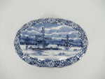 top view of a delftblue jewelry box with Dutch landscape pattern.