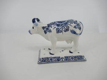 delftblue cow in detailed floral handpainting