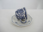 Delftblue cup and saucer in magnificent floral Delft design