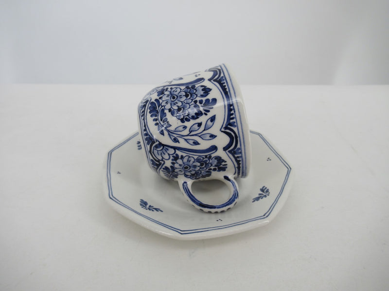 Delftblue cup and saucer in magnificent floral Delft design