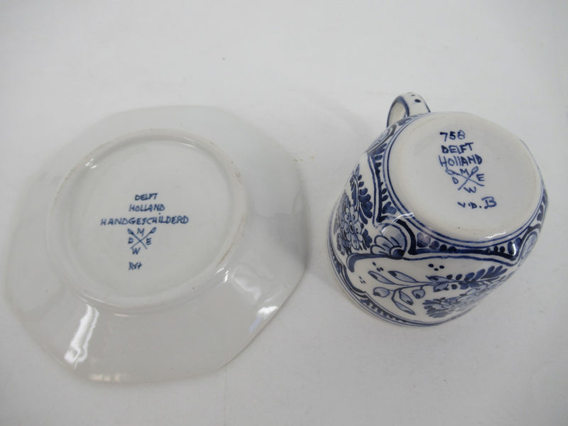 Delftblue cup and saucer in magnificent floral Delft design