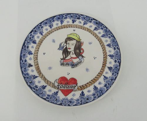 ceramic wall plate in tattoo style saying hello sailer.