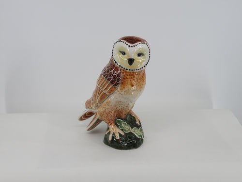 Realistic large ceramic owl in polychrome delft style.