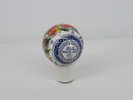 delft ceramic christmas bauble with a red tulip design