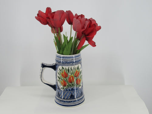 Large ceramic beerstein with a red tulip painted design