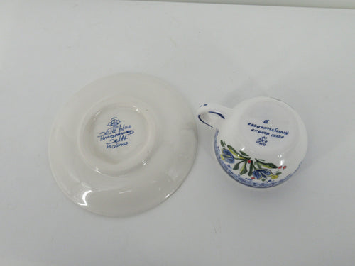 Original handpainted delft cup and saucer with a dutch red tulip design