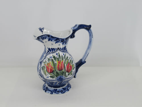 Ceramic water pitcher painted in red tulips.