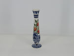 Tall slender ceramic vase with red tulip pattern