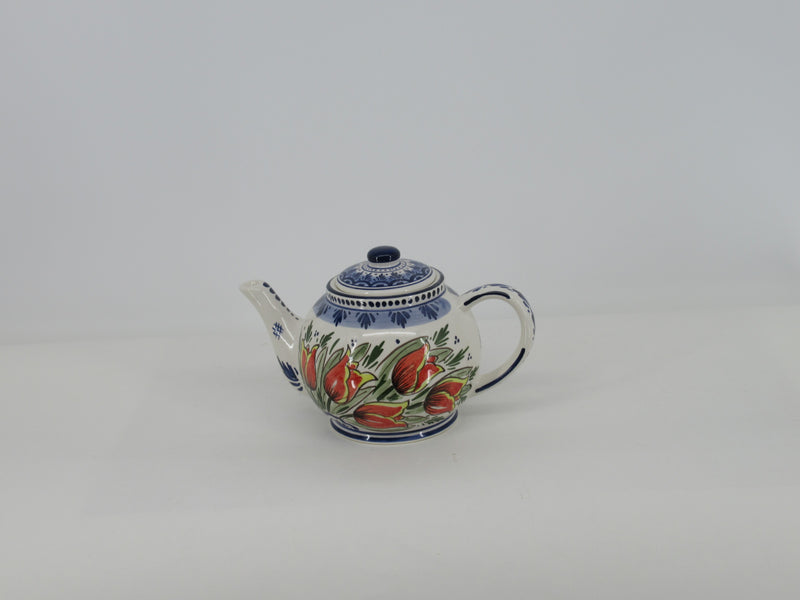 delft round teapot with red tulips