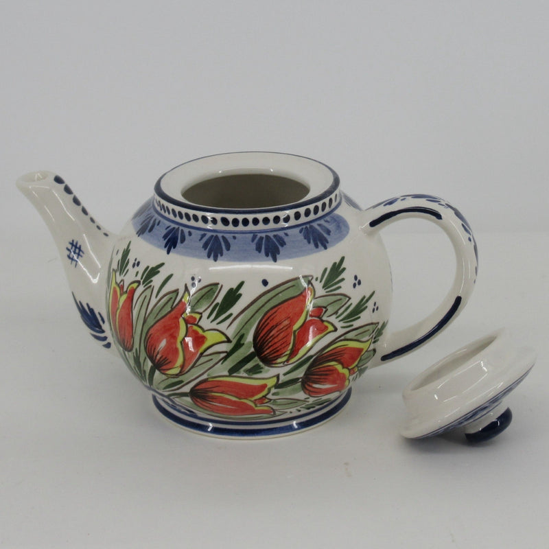 Teapot with handpainted red tulip bouquet in a delftblue design