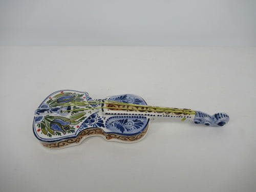 small ceramic violin in handpainted blue tulip design.