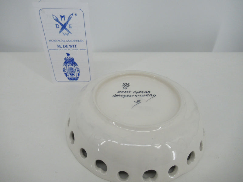 back side of delft dish with delft blue certificate