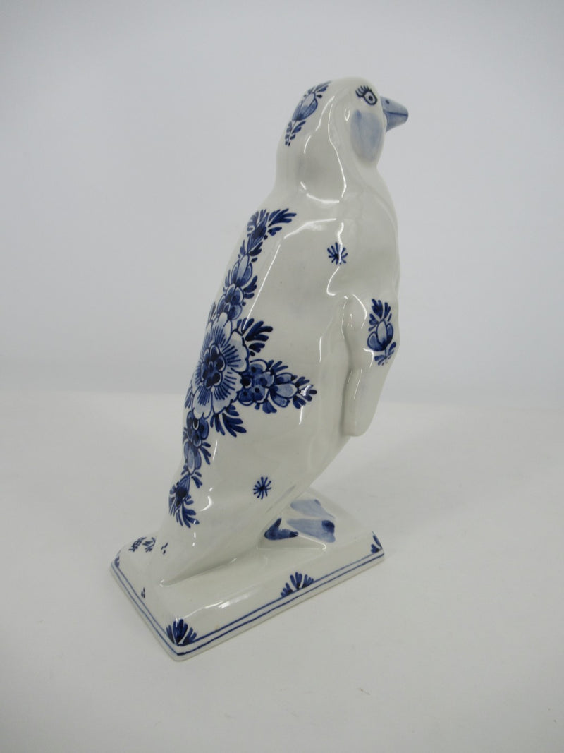 Back view of a handpainted delftblue ceramic penguin