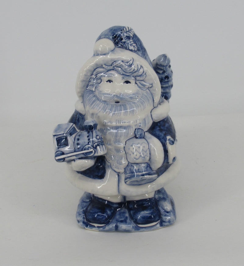 Delftblue ceramic Santa holding a small train