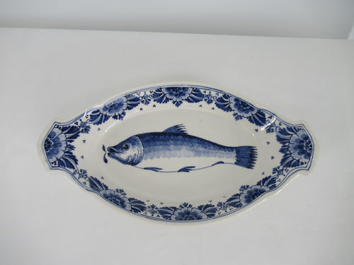 Delftblue herring painted on a ceramic delft dish