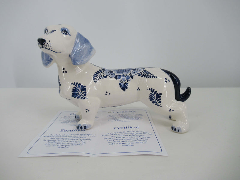Delftblue ceramic Dachshund handpainted in traditional delftstyle