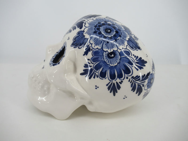 Delft ceramic skull in delft floral design leftside view