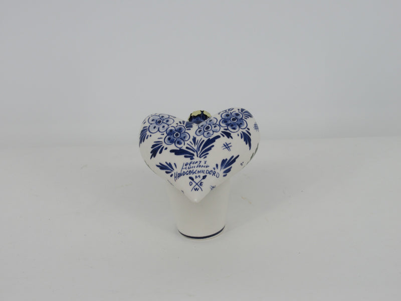 Backside heartshaped ceramic Christmas bauble with a floral delft design