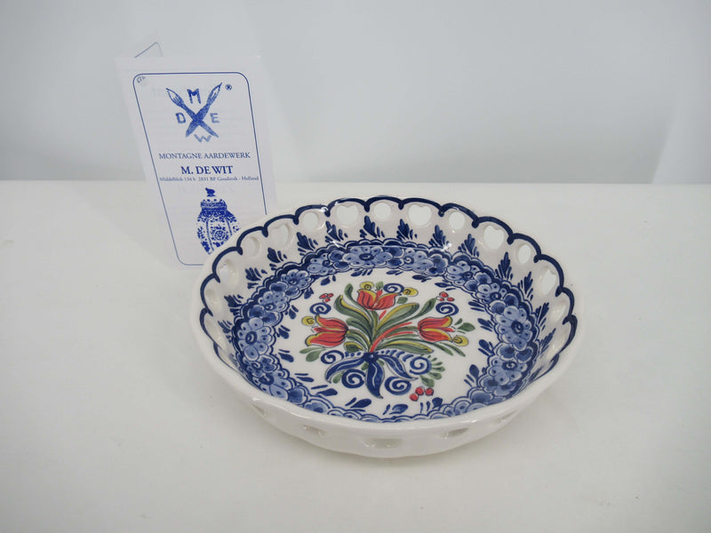open delftblue ceramic dish with handpainted bouquet of red tulip